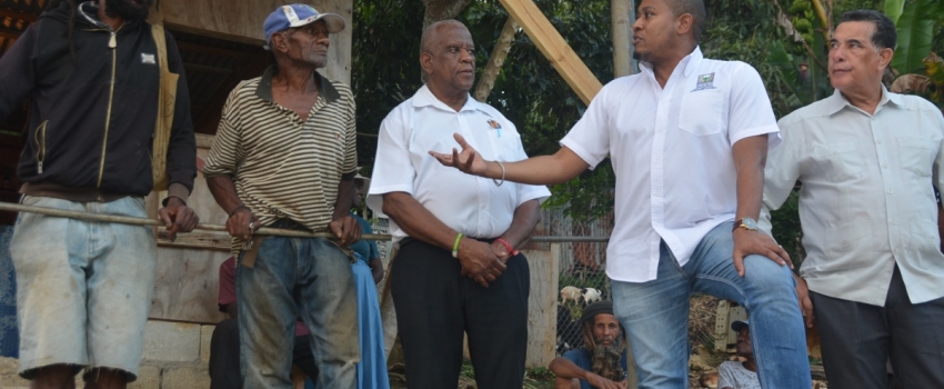 Minister of Agriculture, Fisheries and Mining, Hon. Floyd Green (second from right), converses with farmers Fabian Stennett (left) and Errol Reid (second from left), during a visit to Welcome Hall, St. James, on Thursday, January 17. Looking on are Minister of State in the Ministry of Agriculture, Fisheries and Mining, Hon. Franklin Witter (centre) and Minister of State in the Office of the Prime Minister (West), Hon. Homer Davis.