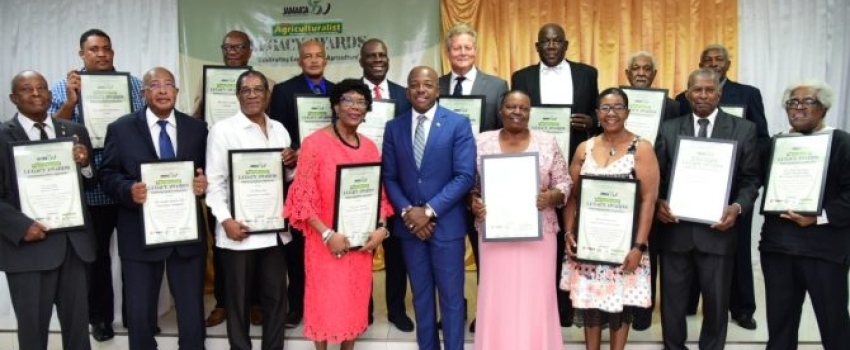Minister of Agriculture and Fisheries, Hon. Pearnel Charles Jr. (centre, front row) is flanked by recipients of the Agricultural Legacy Awards during the ceremony held on Saturday (January 14) at the Medallion Hall Hotel, Kingston.