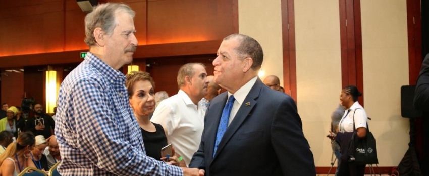 Hon. Audley Shaw (right), Minister of Industry, Commerce, Agriculture and Fisheries, greets Vicente Fox, former president of Mexico, at the 3rd Annual Global B2B Cannabis Conference & Expo, CanEx Jamaica, held at the Montego Bay Conference Centre on Friday, September 28, 2018.
