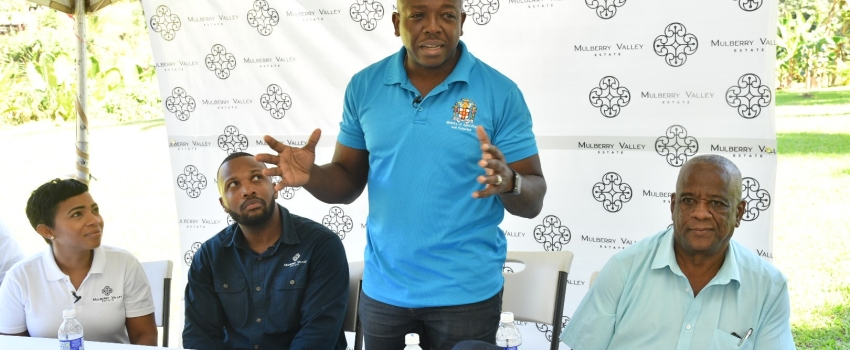 Minister of Agriculture and Fisheries, Hon. Pearnel Charles Jr., delivers remarks during a tour of the Mulberry Valley Estate in Friendship Gap, St. Mary, on Thursday (January 26). At right is State Minister in the Ministry, Hon. Franklin Witter. Also listening are property owners and entrepreneurs, Nicole and Jeffrey Campbell.