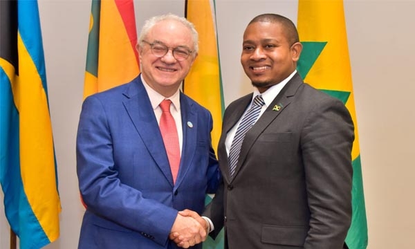 Minister of Agriculture, Fisheries and Mining, Hon. Floyd Green (right) greets the Food and Agriculture Organization Assistant Director General, Mario Lubetkin (left) during the opening ceremony of the High-level Ministerial Meeting for Caribbean ministers of Agriculture and the FAO of the united Nations held at AC Hotel by Marriott in Kingston on Monday (September 18).