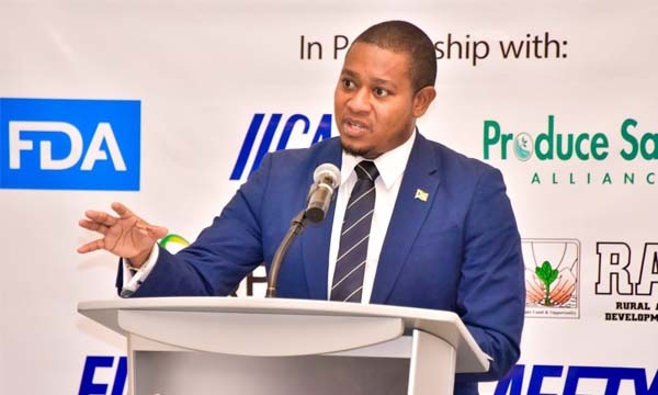 Minister of Agriculture, Fisheries and Mining, Hon. Floyd Green, delivers remarks during the opening session of the Bureau of Standards Jamaica (BSJ)/Food and Drug Administration (FDA) Summit on the Produce Safety Rule, Food Security and Agribusiness Council held at the AC Hotel by Marriott in Kingston on Tuesday, September 26.