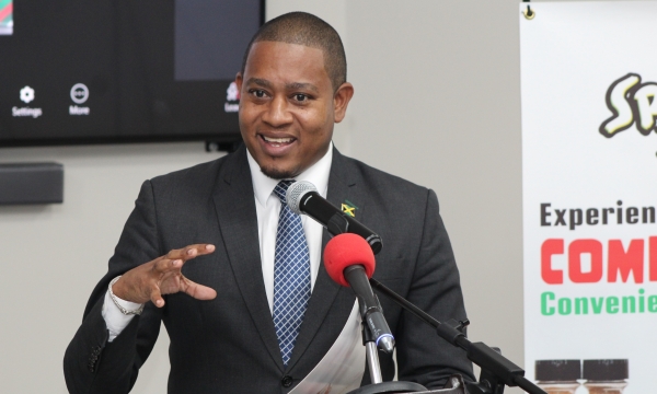 Minister of Agriculture, Fisheries and Mining, Hon. Floyd Green, addresses an audience at the Spur Tree Spices Jamaica ‘Spice Up Di Ting’ Launch held on May 1, at the Jamaica Promotions Corporation’s (JAMPRO) Kingston office.